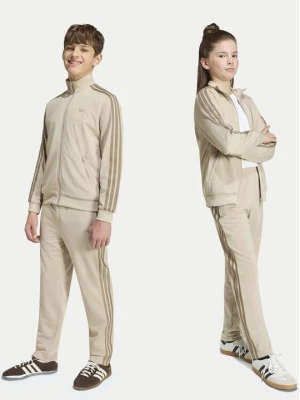 Obrázek produktu adidas Teplákové kalhoty Firebird HZ6652 Světle béžová Regular Fit