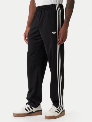 Obrázek produktu adidas Teplákové kalhoty Firebird KD8315 Černá Loose Fit