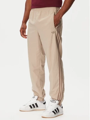 Obrázek produktu adidas Teplákové kalhoty Firebird KS7503 Béžová Regular Fit