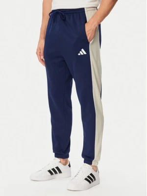 Obrázek produktu adidas Teplákové kalhoty Seasonal Essentials Colorblock Fleece KF4211 Modrá Cosy Fleece Fit
