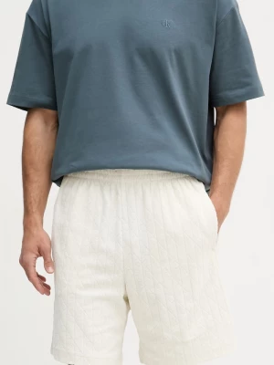 Obrázek produktu Calvin Klein Jeans teplákové šortky pánské bavlněné béžová