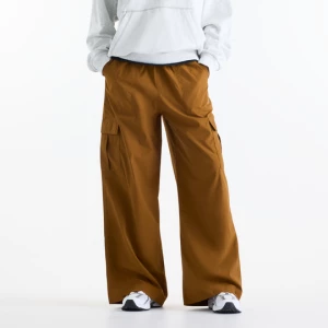 Obrázek produktu Dámské kalhoty New Balance WP53504BFT – hnědý