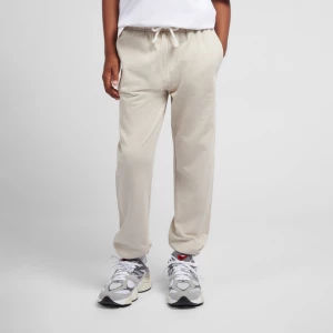 Obrázek produktu Dětské kalhoty New Balance LAKB0060TWF – béžové