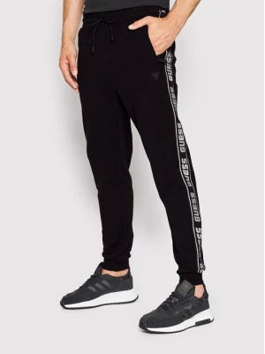 Obrázek produktu Guess Teplákové kalhoty Z2YB19 K6ZS1 Černá Regular Fit