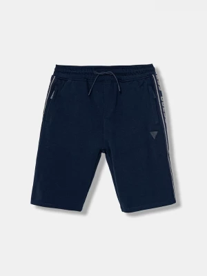 Obrázek produktu Guess teplákové šortky dětské bavlněné s elastanem námořnická modř