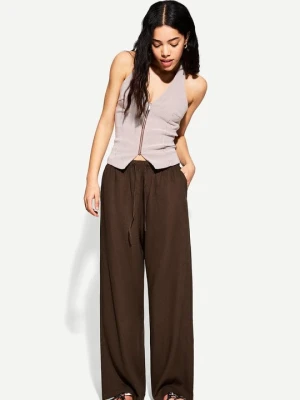 Obrázek produktu Kalhoty Bershka tmavě hnědá