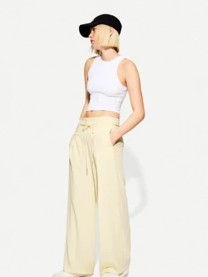 Obrázek produktu Kalhoty Bershka žlutá
