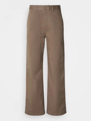 Obrázek produktu Kalhoty Calvin Klein Jeans světle hnědošedá