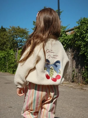Obrázek produktu Konges Sløjd Dětská bunda Konges Sløjd JAZZ TEDDY JACKET GRS béžová
