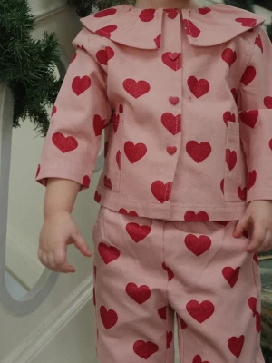 Obrázek produktu Konges Sløjd Dětské rifle Konges Sløjd MAGOT FRILL PANTS GOTS růžová
