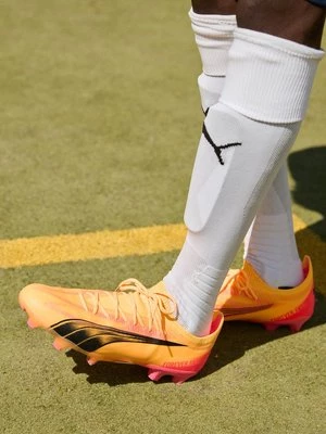Obrázek produktu Kopačky pro pevný povrch Puma skvrnitě žlutá