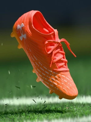 Obrázek produktu Kopačky pro pevný povrch Under Armour oranžová