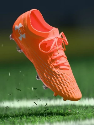 Obrázek produktu Kopačky pro pevný povrch Under Armour oranžová