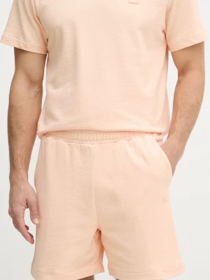 Obrázek produktu Lacoste teplákové šortky pánské bavlněné oranžová