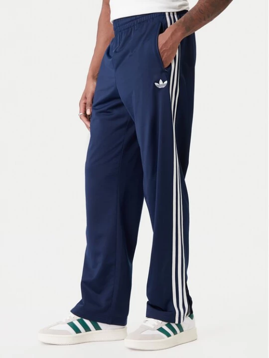 Obrázek produktu adidas Teplákové kalhoty Firebird KD8316 Tmavomodrá Loose Fit