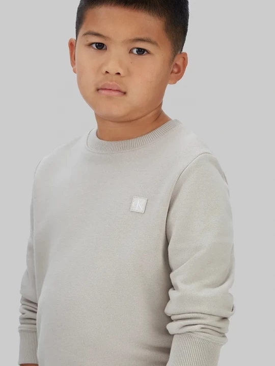 Obrázek produktu Calvin Klein Jeans Dětská mikina Calvin Klein Jeans šedá