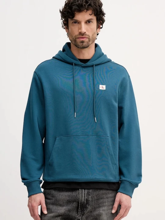 Obrázek produktu Calvin Klein Jeans mikina s kapucí pánská bavlněná tyrkysová