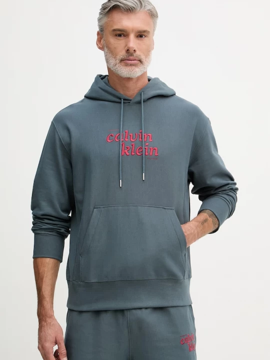 Obrázek produktu Calvin Klein Jeans mikina s kapucí pánská s bavlnou tyrkysová