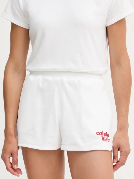Obrázek produktu Calvin Klein Jeans teplákové šortky dámské bavlnou bílá