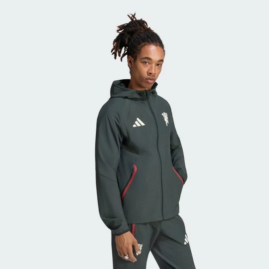 Obrázek produktu Cestovní větrovka se zipem po celé délce Manchester United Tiro Adidas Jungle Ink