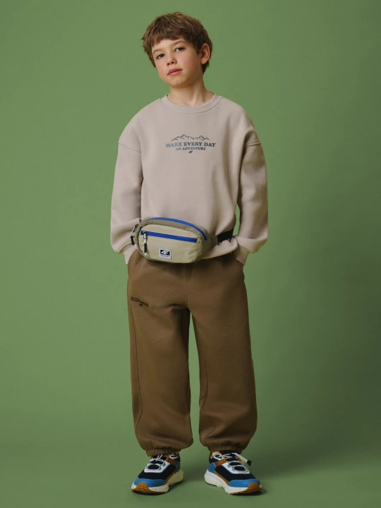 Obrázek produktu Chlapecké jogger teplákové kalhoty - hnědé 4F