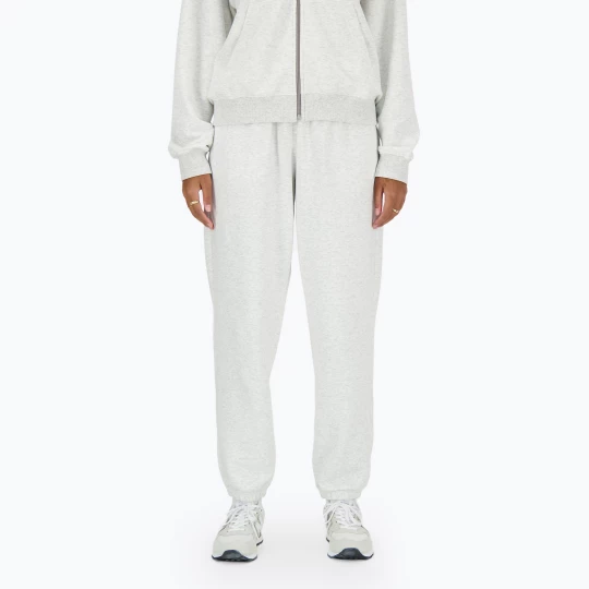 Obrázek produktu Dámské kalhoty New Balance French Terry Jogger ashheath šedá