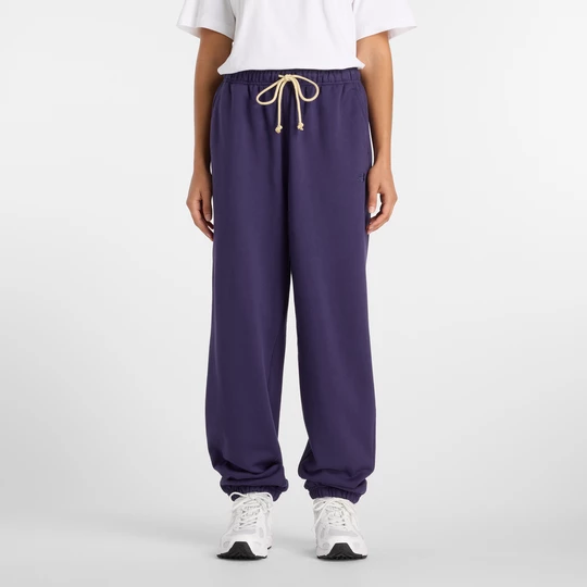 Obrázek produktu Dámské kalhoty New Balance WP41513BOY – fialové