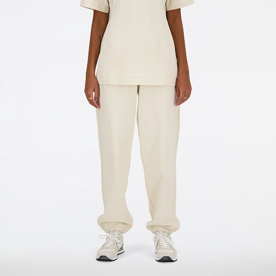 Obrázek produktu Dámské kalhoty New Balance WP41513LIN – béžové