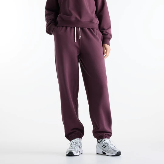 Obrázek produktu Dámské kalhoty New Balance WP41513YLR – fialové