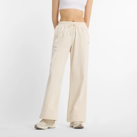 Obrázek produktu Dámské kalhoty New Balance WP51503LIN – béžové