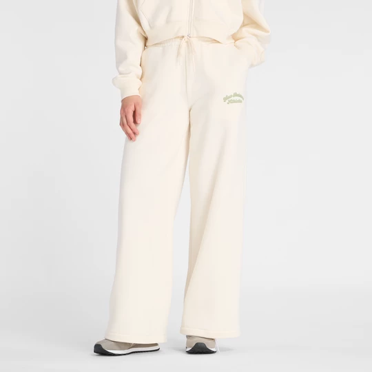 Obrázek produktu Dámské kalhoty New Balance WP53902PEF – béžové