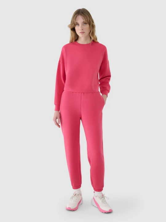 Obrázek produktu Dámské tepláky typu jogger s modálem - růžové 4F