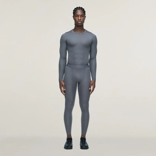 Obrázek produktu Dlouhé sportovní legíny adidas x entire studios Techfit Granite