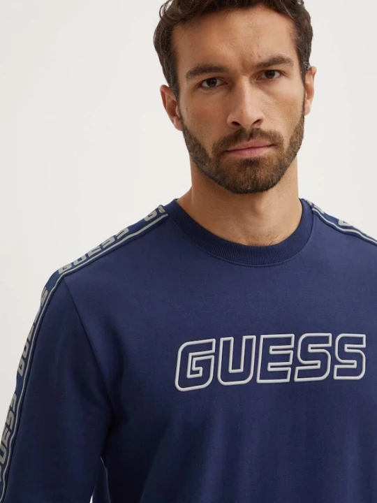 Obrázek produktu Guess mikina pánská s bavlnou ARLO námořnická modř