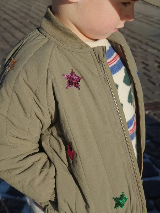 Obrázek produktu Konges Sløjd Dětská bomber bunda Konges Sløjd JUNO SEQUIN BOMBER JACKET zelená
