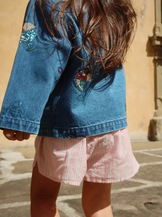 Obrázek produktu Konges Sløjd Dětská riflová bunda MAGOT SEQUIN DENIM JACKET GOTS námořnická modř