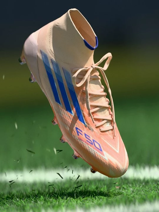 Obrázek produktu Kopačky pro pevný povrch Adidas oranžová