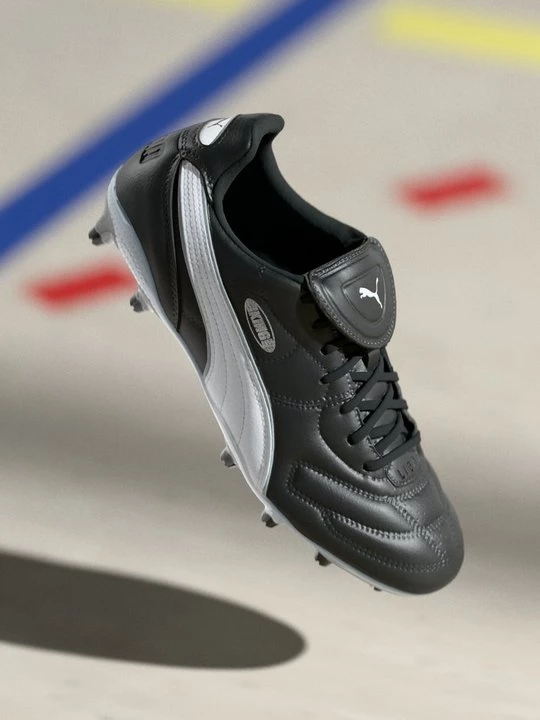 Obrázek produktu Kopačky pro pevný povrch Puma černá