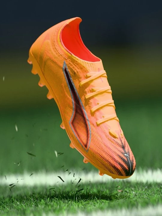 Obrázek produktu Kopačky pro pevný povrch Puma oranžová