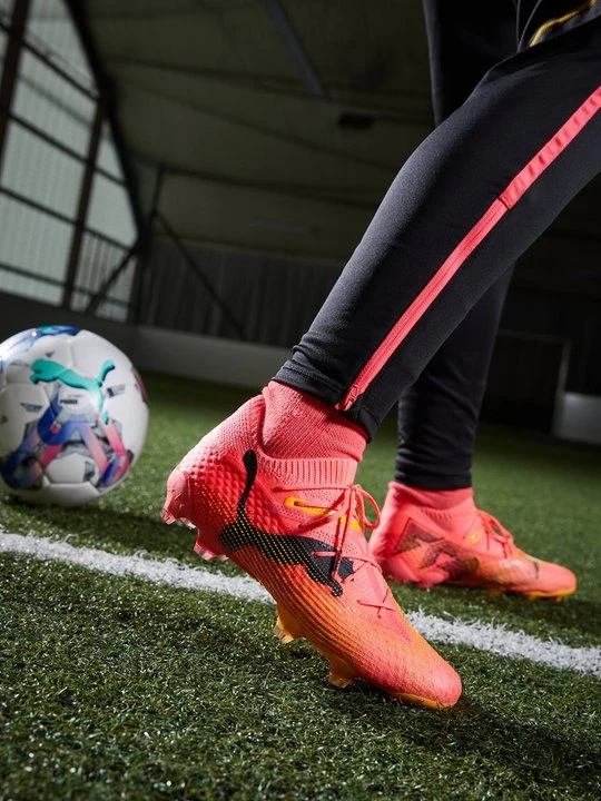 Obrázek produktu Kopačky pro pevný povrch Puma skvrnitě oranžová