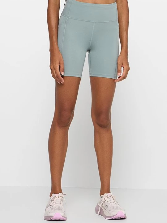 Obrázek produktu Krátké běžecké legíny Under Armour zelená