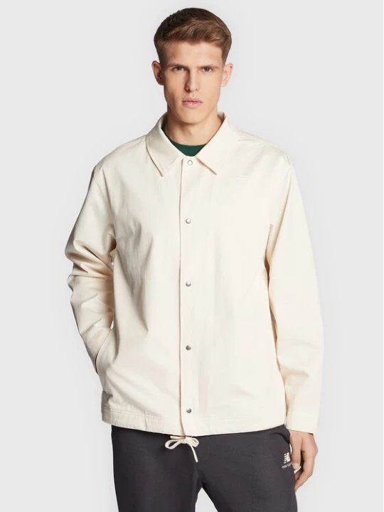 Obrázek produktu New Balance Bunda pro přechodné období Athletics Nature State MJ23552 Béžová Relaxed Fit