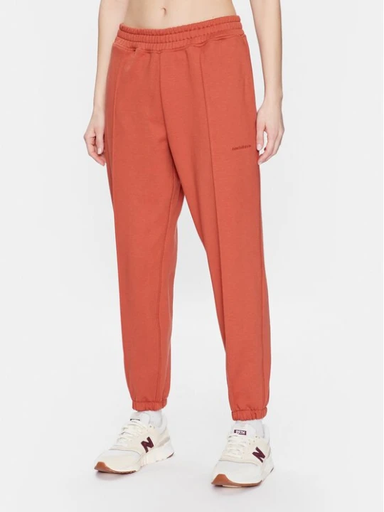 Obrázek produktu New Balance Teplákové kalhoty Athletics Nature WP23553 Oranžová Relaxed Fit