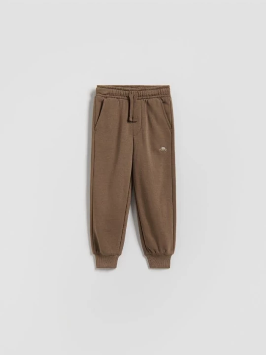 Obrázek produktu Reserved - Bavlněné jogger kalhoty - hnědá