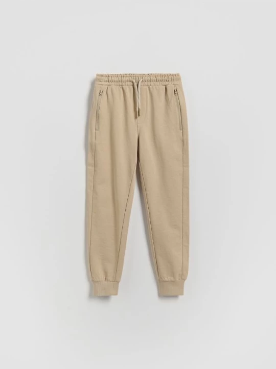 Obrázek produktu Reserved - Bavlněné kalhoty joggers - béžová