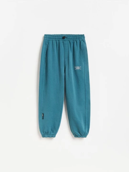 Obrázek produktu Reserved - Bavlněné kalhoty joggers - tmavě tyrkysová