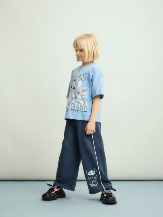 Obrázek produktu Reserved - Kalhoty s přívěskem Lilo a Stitch - tmavomodrá