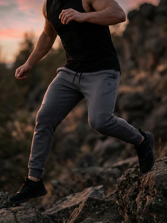 Obrázek produktu Sinsay - Kalhoty tapered fit SNSY PERFORMANCE - šedá