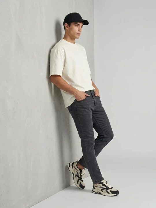 Obrázek produktu Sinsay - Slim fit džíny s efektem praní - černá