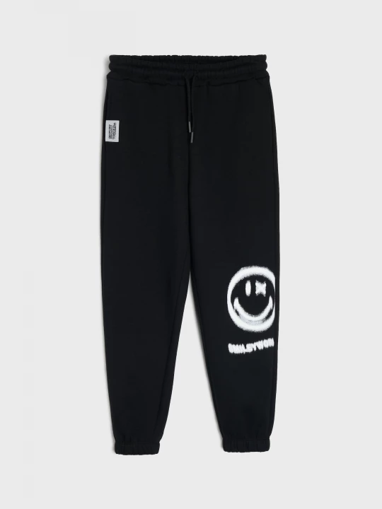 Obrázek produktu Sinsay - Spodnie loose z nadrukiem SmileyWorld® - czarny